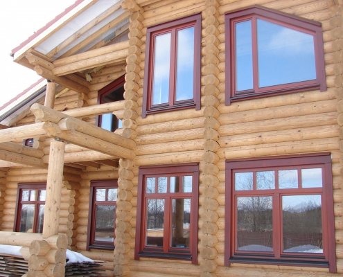 Пластиковые окна для деревянных домов