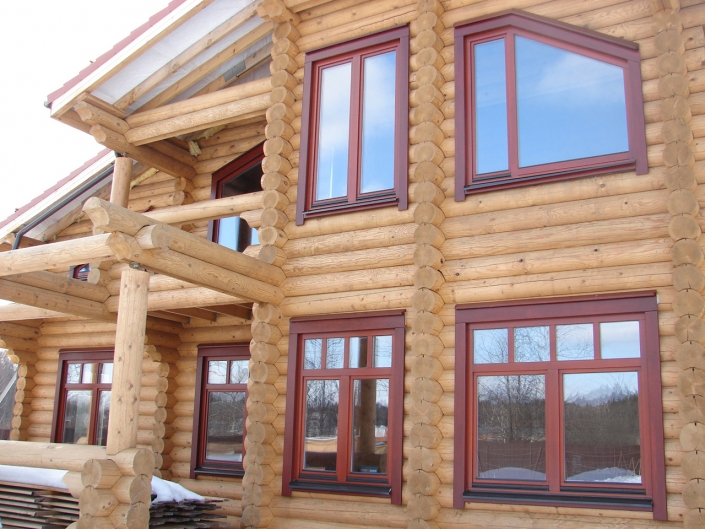 Пластиковые окна для деревянных домов